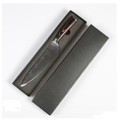 Knife with rose gold handle in a black box on a white background