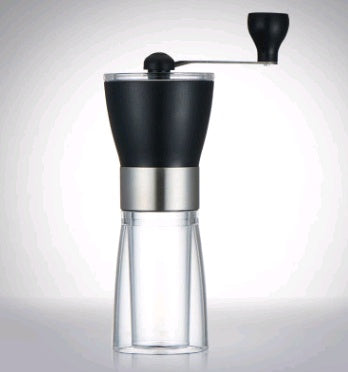 Black and silver manual coffee grinder on a white background