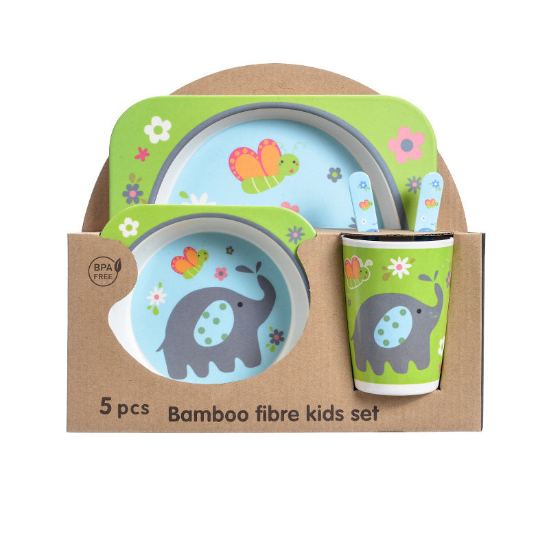 Bamboo fibre kids set with plates, bowl, cup, and utensils in a cardboard packaging on a white background.