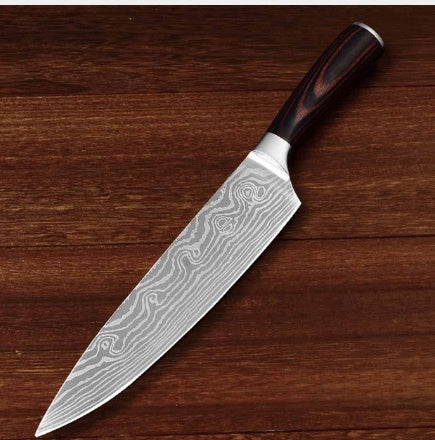Damascus knife on a wooden surface