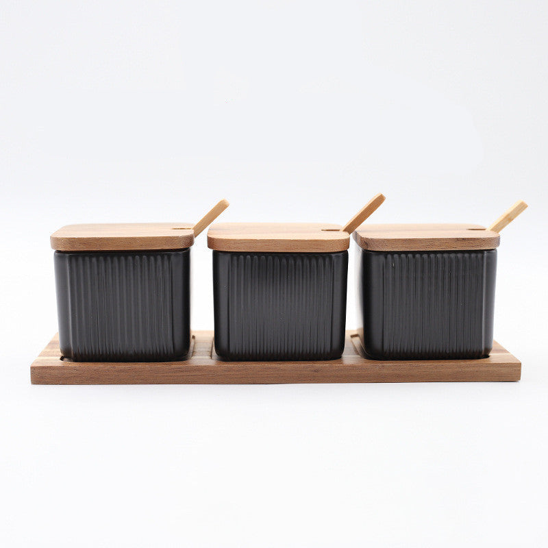 Three black containers with wooden lids on a wooden stand, labeled 'Black' and '30.5X10.7cm'.