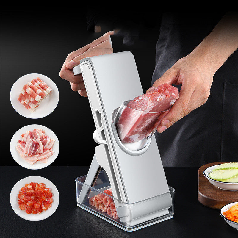 Person using a meat tenderizer with sliced meat on plates and vegetables on the side.